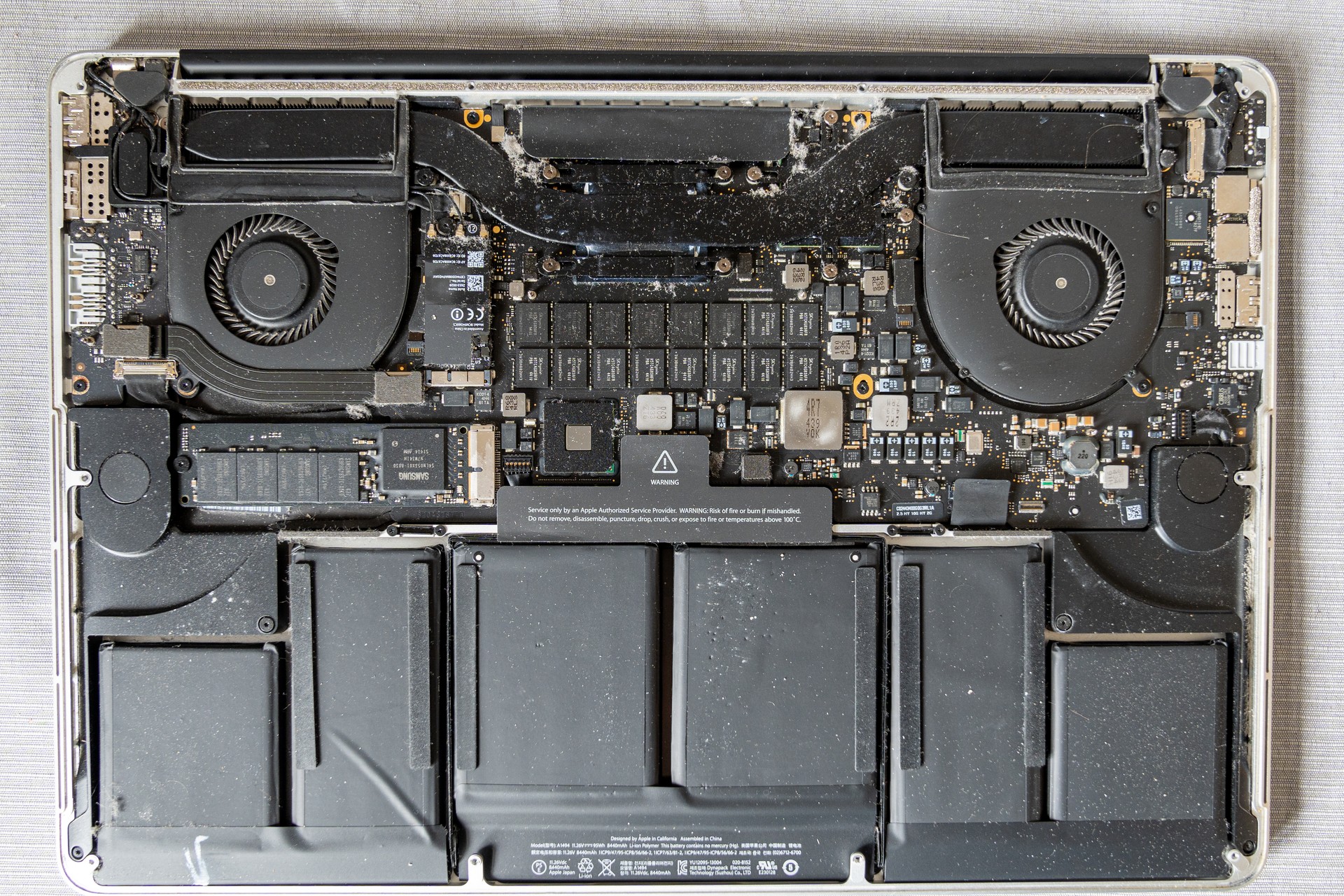 Dust inside a laptop computer. The cause of computer overheating